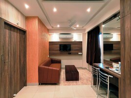 Luxury Suite, City View | Desk, soundproofing, iron/ironing board, free WiFi