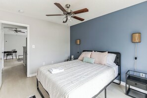1 bedroom, desk, iron/ironing board, travel crib