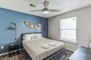 1 bedroom, desk, iron/ironing board, travel crib