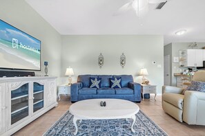 Deluxe Condo, 2 Bedrooms, Non Smoking, Balcony | Living room | 65-inch Smart TV with cable channels - Romar Lakes 104B (Orange Beach)