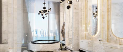 Separate tub and shower, rainfall showerhead, hair dryer, slippers