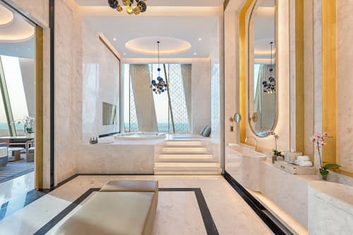 Royal Penthouse | Bathroom | Separate tub and shower, rainfall showerhead, hair dryer, slippers