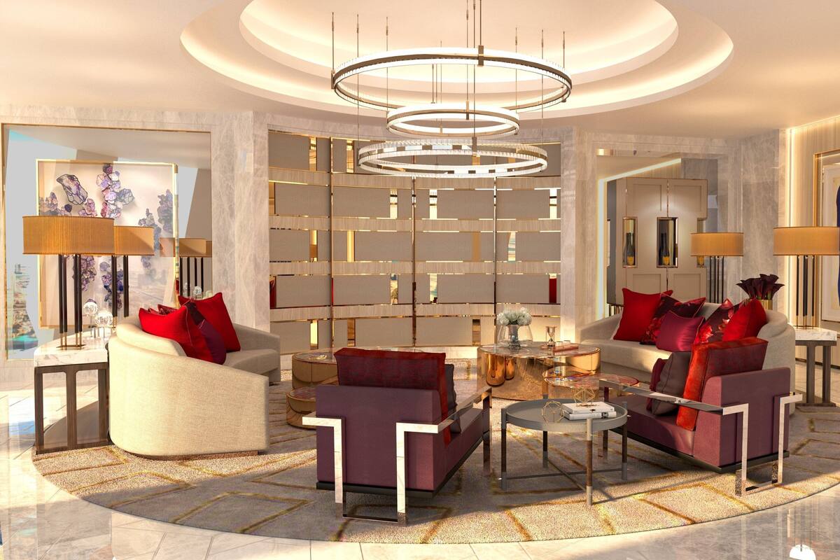 Un salon moderne comprenant un ensemble de canapés, une table basse et un mur décoratif.