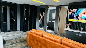 Apartamento luxo, vista para a cidade | Área de estar