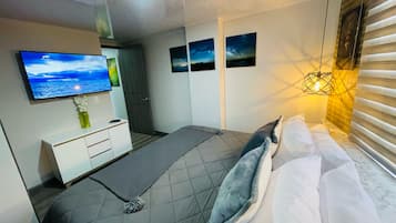 Apartamento conforto, sacada, vista para a cidade | Cortinas blackout, ferros/tábuas de passar roupa