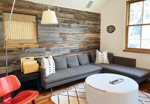 TV, fireplace, books