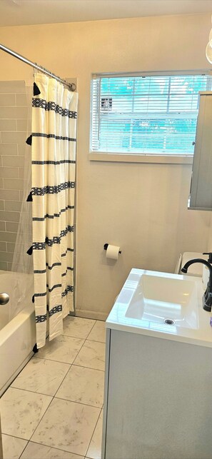 Hair dryer, towels, soap, shampoo