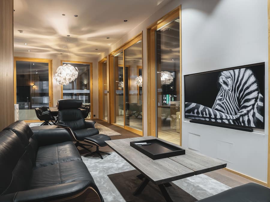 Luksus-loftsleilighet, balkong, byutsikt | Oppholdsområde | Flatskjerm-TV