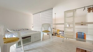 A child's bedroom with a bunk bed, a desk, a chair, and a shelving unit. - 4024 Casina Litta by Barbarhouse (Cutrofiano)