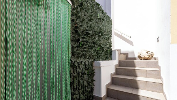 A staircase with beige steps and a white wall. - 4088 Da Nonno Claudio by Barbarhouse (Galatina)