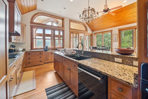 Hidden Waterfront Luxury Oasis With 9-acre Pond 5 Bedroom Home by RedAwning