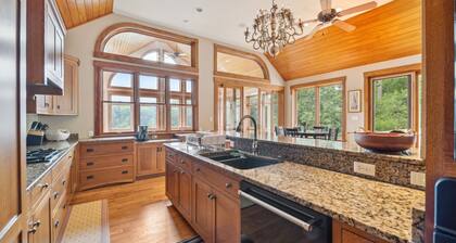 Hidden Waterfront Luxury Oasis With 9-acre Pond 5 Bedroom Home by RedAwning