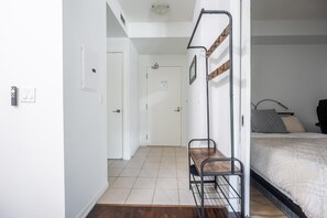 1 bedroom, desk, iron/ironing board, travel cot