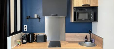 Fridge, microwave, coffee/tea maker, toaster
