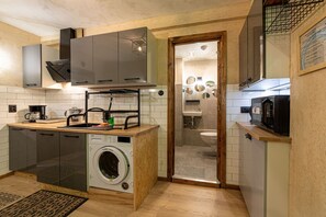 Design apartman | Privát konyha | Elektromos vízforraló és kenyérpirító