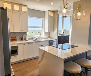 Fridge, microwave, oven, stovetop - Grand Bay 2 BR / 2 BA Condo on LBK by FVC (Longboat Key)