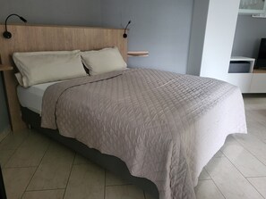 1 quarto, Wi-Fi de cortesia, roupa de cama