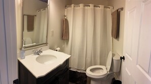 Hair dryer, towels, soap, shampoo