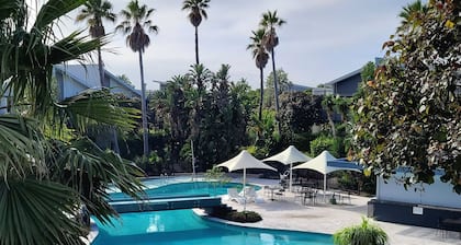 Magenta Palms on Golf Course with Pools & Beach access