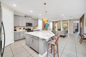 Fridge, microwave, oven, stovetop - Stunning 7 Bed Pool Home with Themed Rooms-8919CBD (Kissimmee)