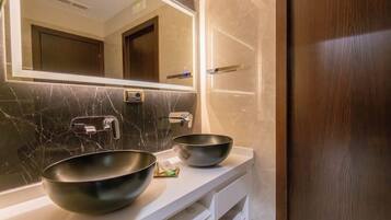 Shower, jetted tub, hair dryer, bidet