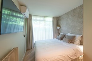 1 slaapkamer, een strijkplank/strijkijzer, reisbedje, wifi