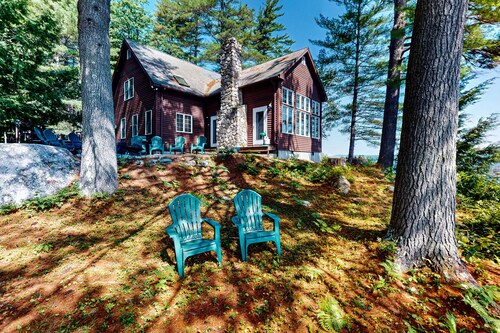 Tranquil Lakefront Retreat with Private Beach and Spacious Living