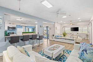 Télévision, table de tennis de table, livres