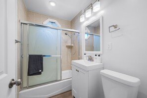 Hair dryer, towels, soap, shampoo