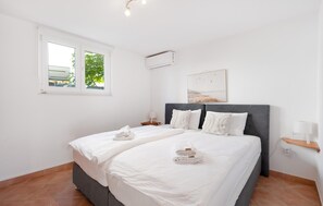 2 quartos, ferros/tábuas de passar roupa, Wi-Fi de cortesia