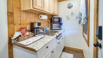 Fridge, microwave, coffee/tea maker, toaster