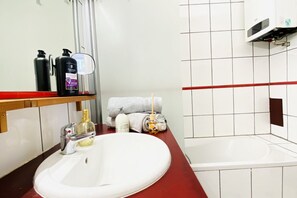 Hair dryer, towels, soap, shampoo