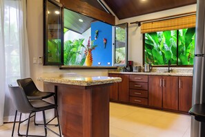 Family Chalet, Kitchen, Garden View | Private kitchen | Electric kettle, highchair