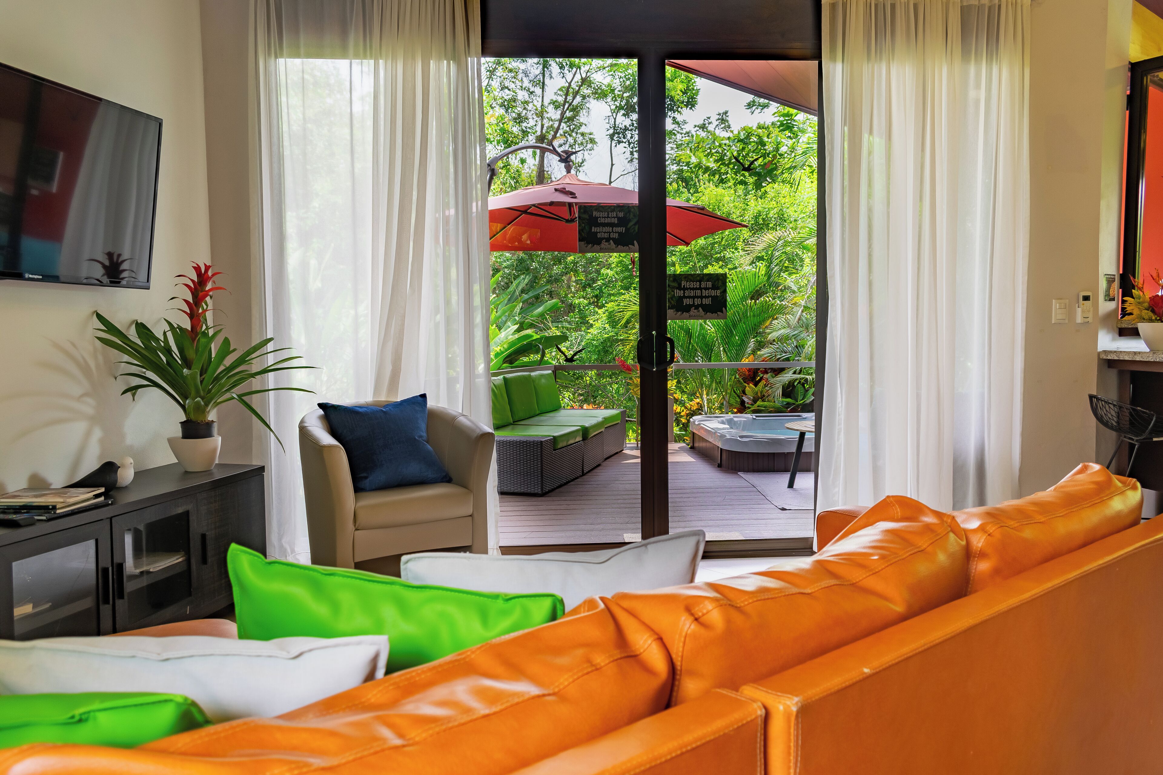 Family Chalet, Garden View | Living area | Flat-screen TV