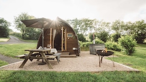A rustic wooden cabin with a picnic table and a fire pit. - Hot Tub Cabin With Views Over The Brecon Beacons (Brecon)