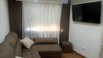 Televisie en een open haard