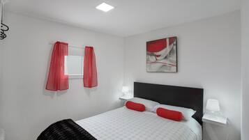 1 dormitorio, tabla de planchar con plancha, wifi gratis y ropa de cama