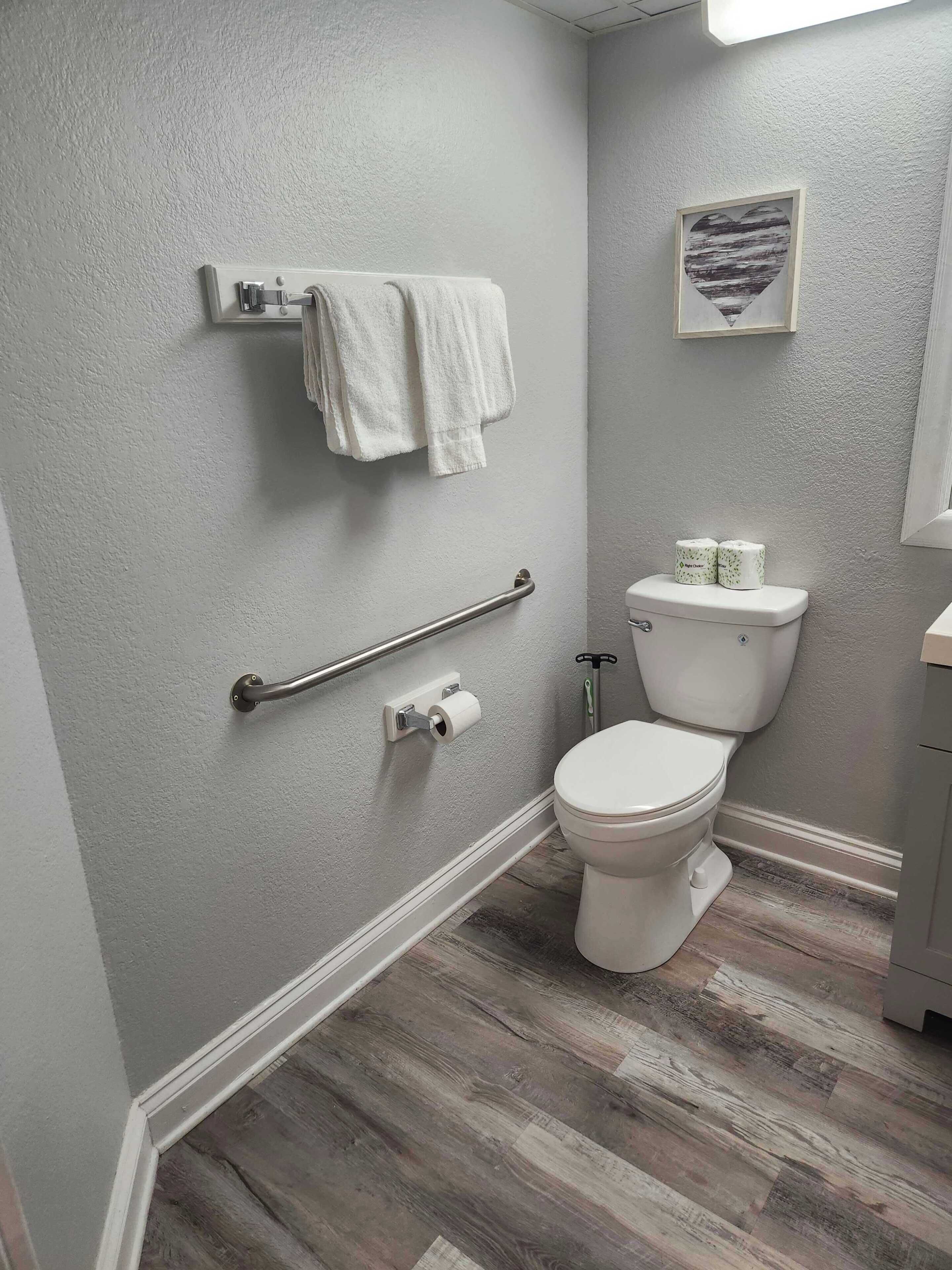 Shower, hair dryer, towels, shampoo