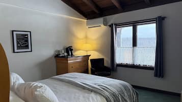 Standard Room | Premium bedding, blackout drapes, iron/ironing board, free rollaway beds