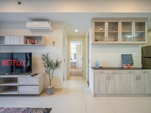Appartement Deluxe, 2 chambres, vue ville | Coin séjour