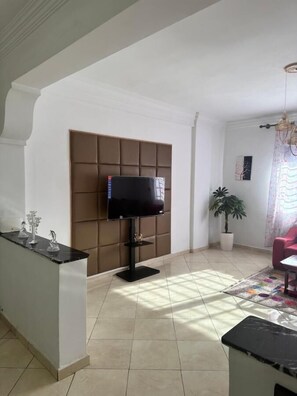 Apartment, Mountain View | Living area | Flat-screen TV