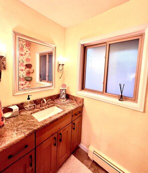 Shower, eco-friendly toiletries, bidet, towels