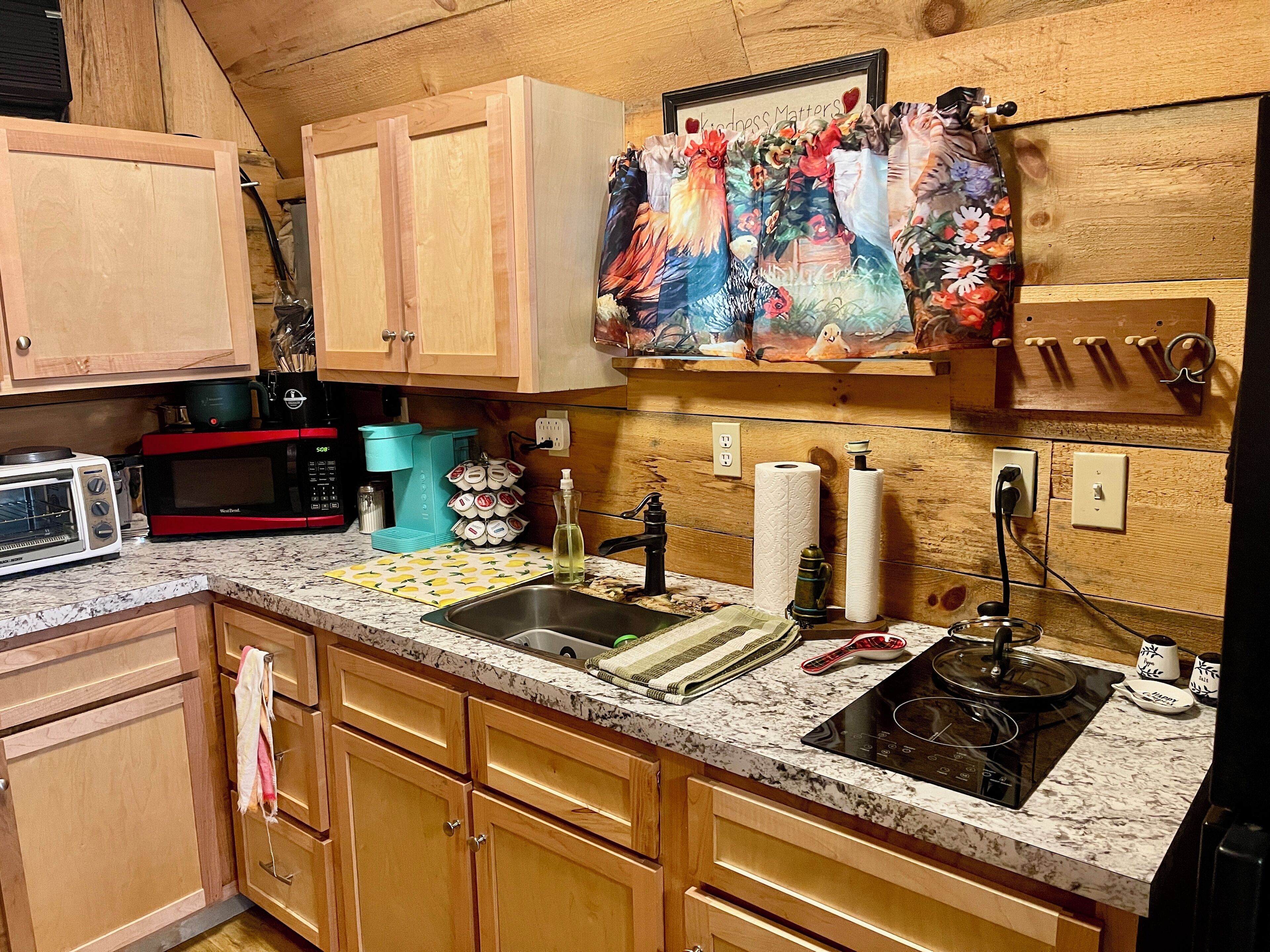 Fridge, microwave, coffee/tea maker, toaster