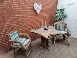 Outdoor dining - Holiday Home 'Haus Kalle' with Wi-Fi and Air Conditioning (Wittmund/Harlesiel)