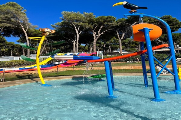 A water park with various slides and play structures. - Bungalow near Pals Beach & Pool (Pals)