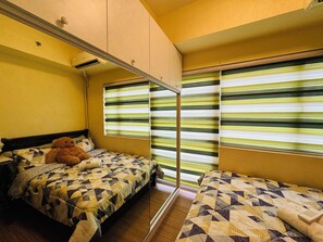 1 bedroom, iron/ironing board, WiFi, bed sheets - Cozy condo in enjoyable Taguig with WiFi, AC (Taguig)