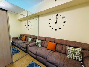 Living area - Cozy condo in enjoyable Taguig with WiFi, AC (Taguig)