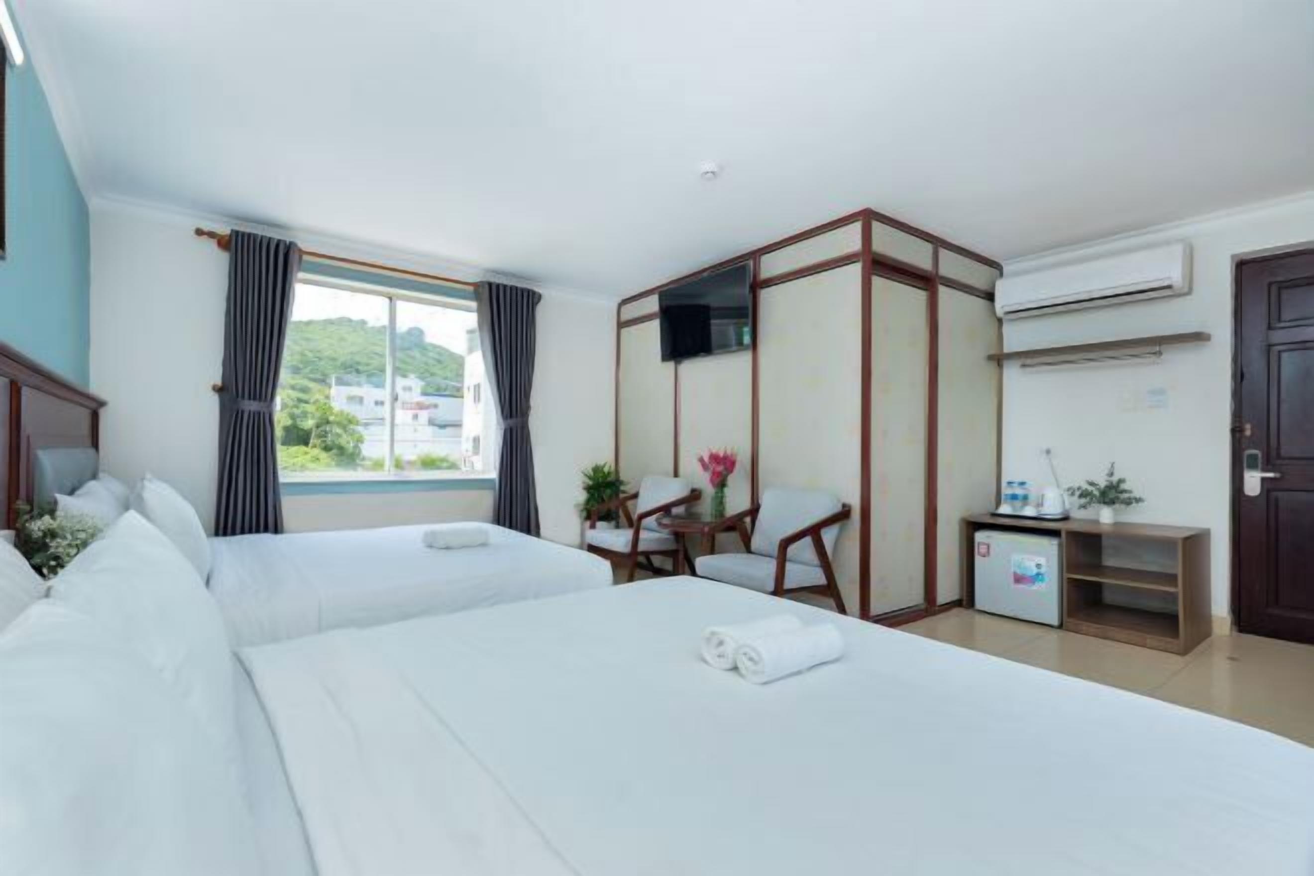 Premium bedding, memory-foam beds, minibar, desk