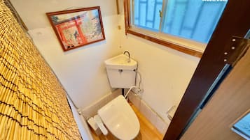 Hair dryer, towels, soap, toilet paper