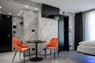 Deluxe Quadruple Room | Premium bedding, down comforters, memory foam beds, free minibar